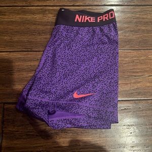 Woman’s Medium Purple Nike Pros
